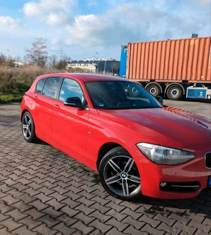 Rot Gebraucht 2012 BMW 116 Sport Line Kleinwagen | 7.500 € (Fairer Preis) - Bild 1/4