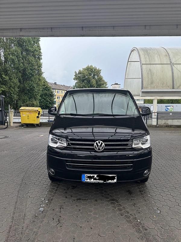 Schwarz Gebraucht 2014 VW Multivan Highline Van | 19.990 € (Superpreis) - Bild 1/4