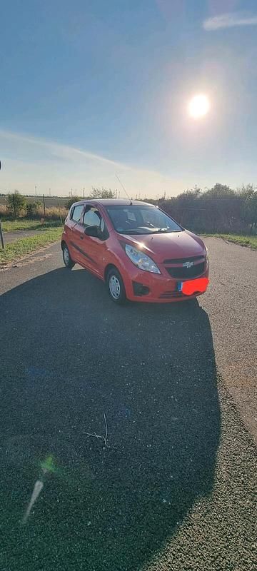 Rot Gebraucht 2012 Chevrolet Spark Kleinwagen | 2.499 € (Fairer Preis) - Bild 1/4