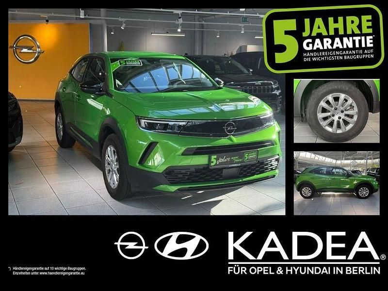 Matcha green/ikone gruen Gebraucht 2022 Opel Mokka SUV | 15.490 € (Superpreis) - Bild 1/3