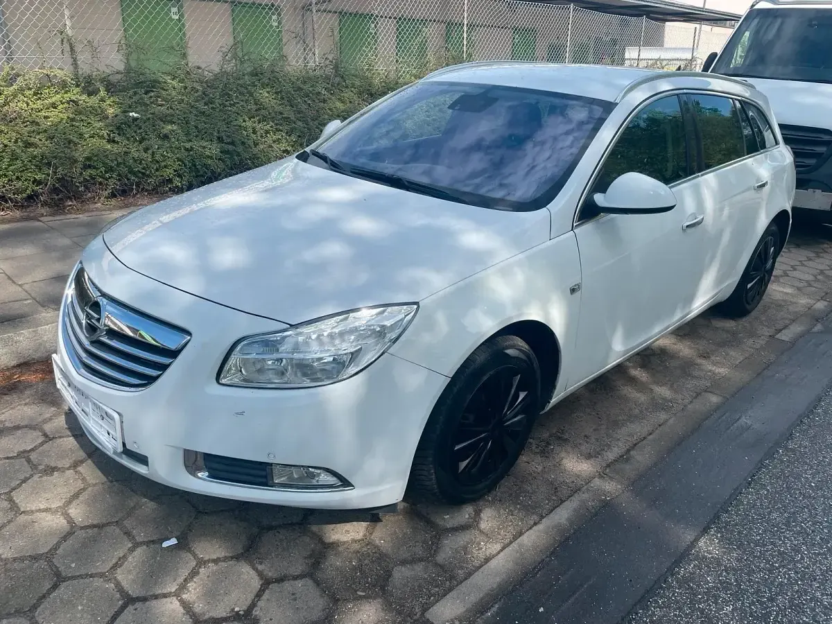 Używany Opel Insignia 160 KM (117 kW) 2011 Biały Kombi