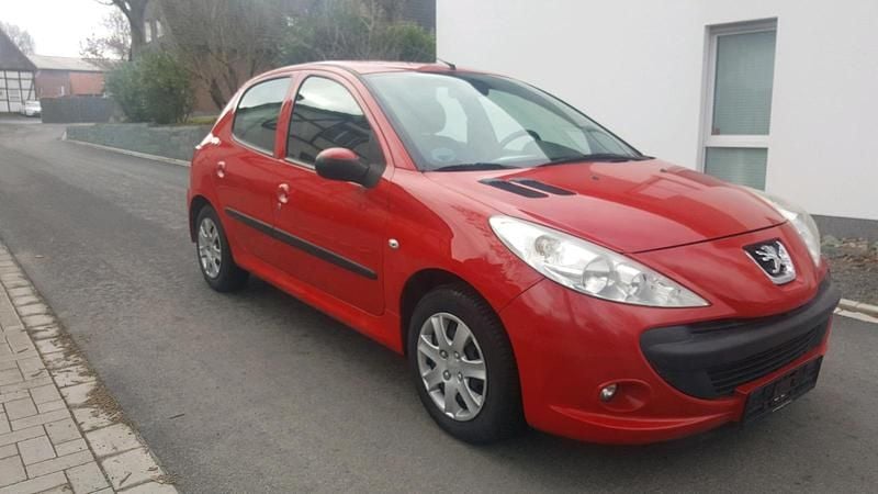 Gebraucht Peugeot 206+ 75 PS (55 kW) 2010 Rot Kleinwagen