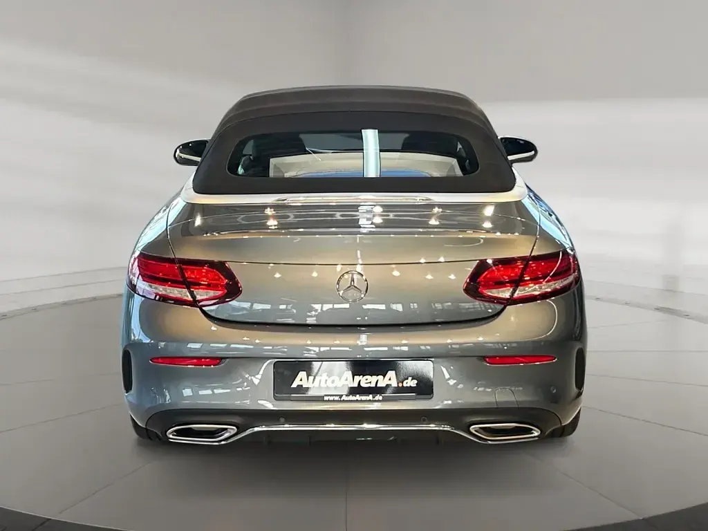 Gebraucht Mercedes C180 AMG 156 PS (114 kW) 2023 Metalliclack selenitgrau Cabrio