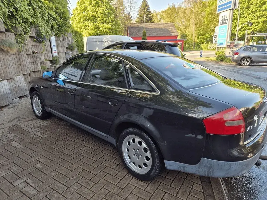 Używany Audi A6 165 KM (121 kW) 2001 Czarny Sedan/Limuzyna