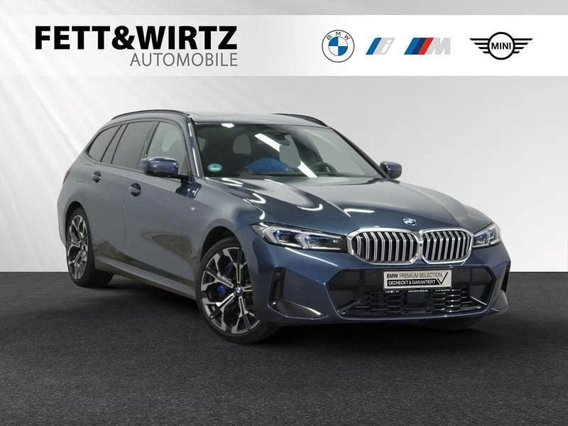 Arctic race blue metallic Gebraucht 2024 BMW 330e M Sport Kombi | 51.799 € (Teuer) - Bild 1/2
