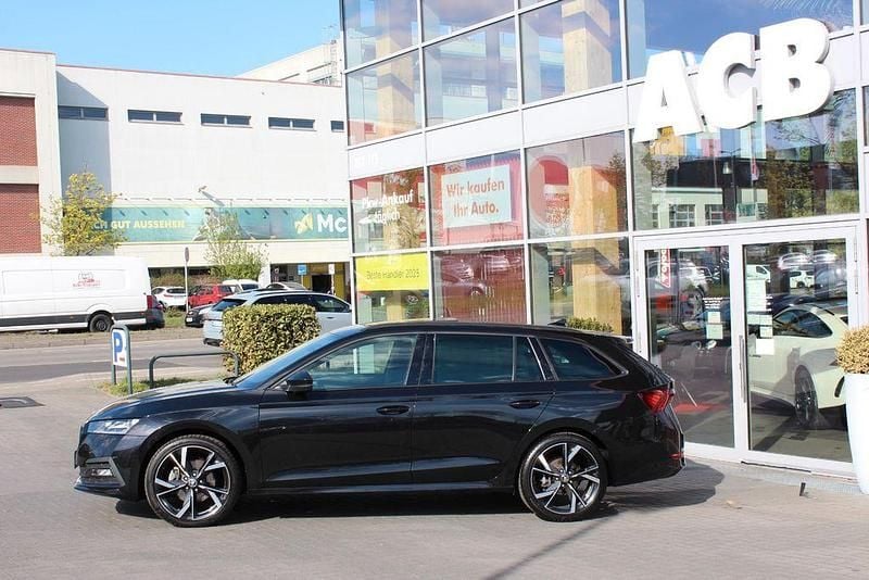 Gebraucht Skoda Octavia SportLine 210 PS (154 kW) 2023 Cerna magic/black magic (metallic) Kombi