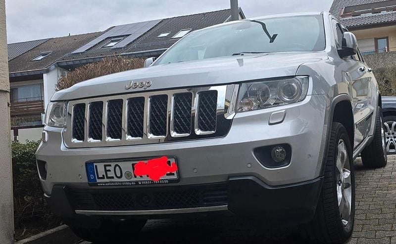Gebraucht Jeep Grand Cherokee Overland 352 PS (258 kW) 2011 Silber SUV