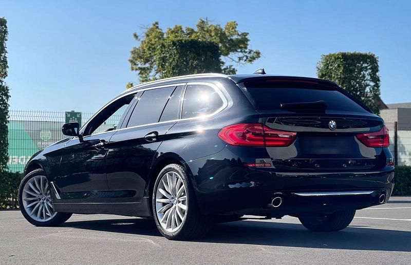 Second-hand BMW 520 Luxury Line 190 CP (139 kW) 2018 Negru Break