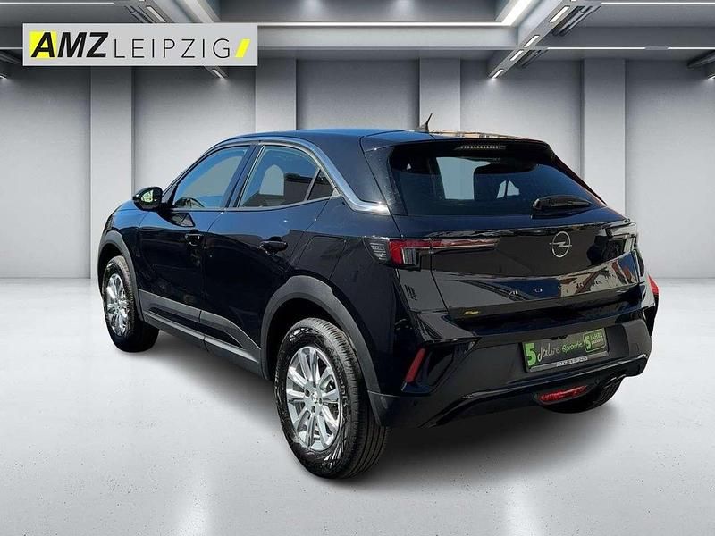Gebraucht Opel Mokka Enjoy 131 PS (96 kW) 2023 Lackierung schwarz perla nera/typ aussen (metallic) SUV