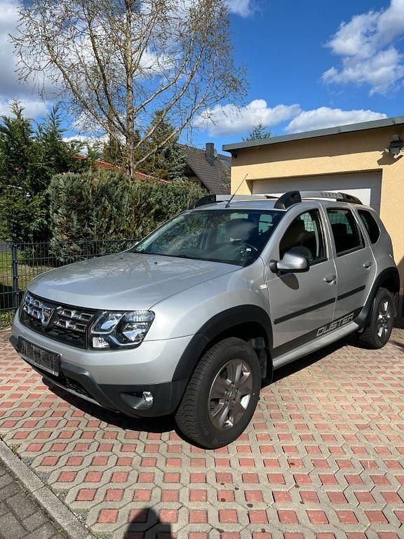 Second-hand Dacia Duster 125 CP (91 kW) 2014 Argintiu SUV