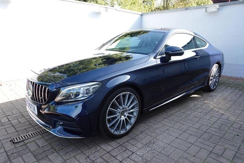 Blau Gebraucht 2019 Mercedes C180 AMG line Coupé | 28.490 € (Superpreis) - Bild 1/4