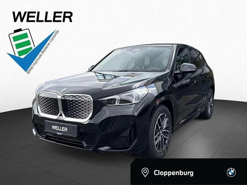 Schwarz Gebraucht 2024 BMW iX1 Luxury Line SUV | 47.990 € (Fairer Preis) - Bild 1/3