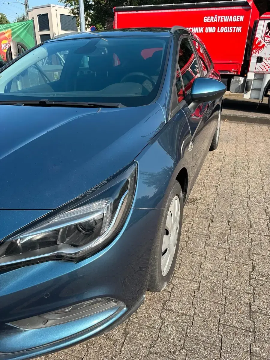Gebraucht Opel Astra Business 135 PS (99 kW) 2017 Blau Kombi
