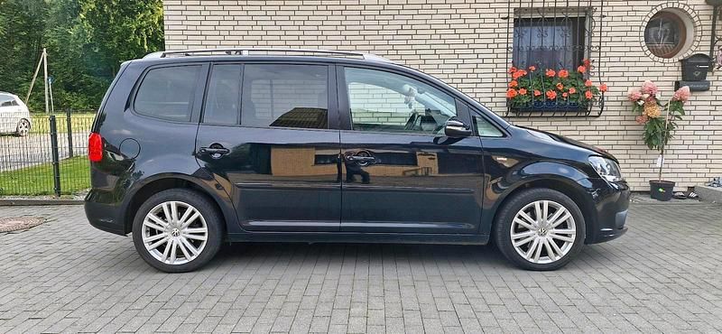 Schwarz Gebraucht 2012 VW Touran Van / Kleinbus | 9.850 € (Fairer Preis) - Bild 1/4