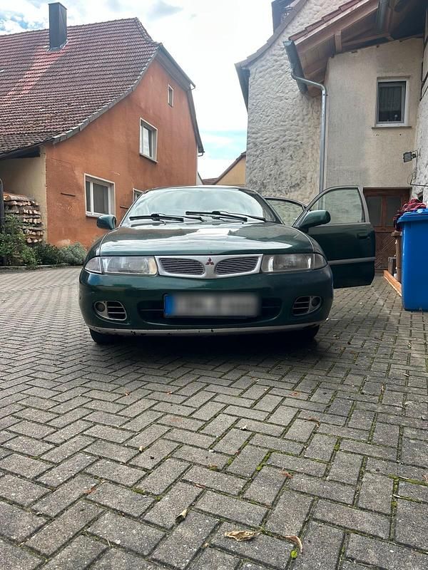 Grün Gebraucht 1998 Mitsubishi Carisma Limousine | 750 € - Bild 1/4