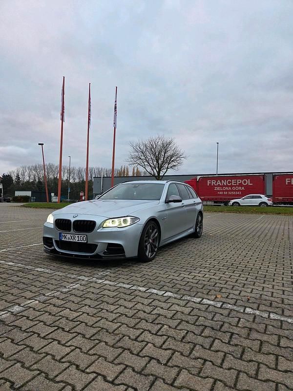 Grau Gebraucht 2014 BMW M550 M Performance Limousine | 17.800 € (Guter Preis) - Bild 1/4