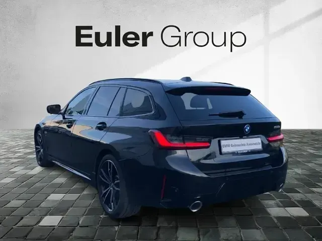 Gebraucht BMW 330e Performance 292 PS (214 kW) 2022 Saphirschwarz Kombi