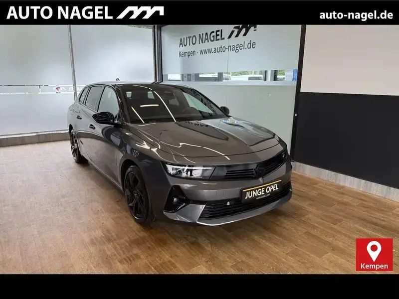 Vulkan grau Gebraucht 2024 Opel Astra GS Line Kombi | 25.686 € (Guter Preis) - Bild 1/4