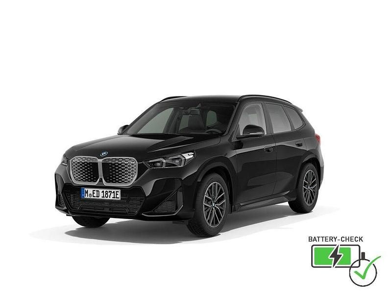 Schwarz Neu 2025 BMW iX1 M Sport SUV | 68.985 € - Bild 1/4