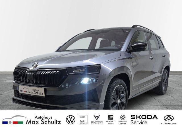 Grau Gebraucht 2024 Skoda Karoq SportLine SUV | 36.990 € (Fairer Preis) - Bild 1/3