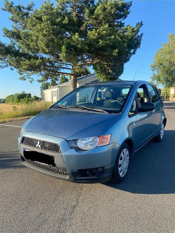 Blau Gebraucht 2009 Mitsubishi Colt Kleinwagen | 1.890 € - Bild 1/4