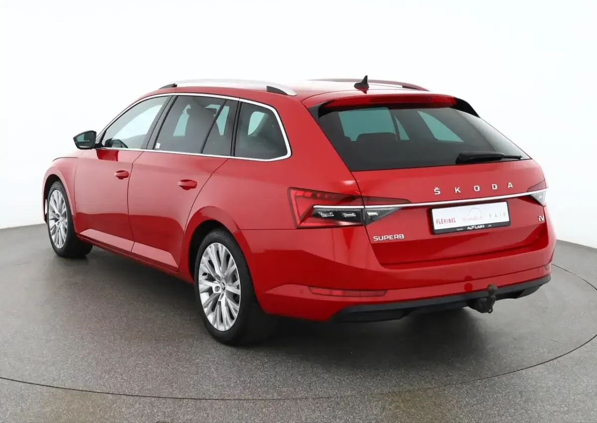 Używany Skoda Superb 218 KM (160 kW) 2021 Czerwony Kombi
