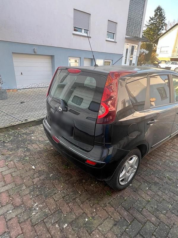 Gebraucht Nissan Note 87 PS (63 kW) 2010 Schwarz Kleinwagen
