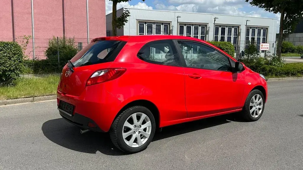 Gebraucht Mazda 2 Active 75 PS (55 kW) 2011 Rot Kleinwagen
