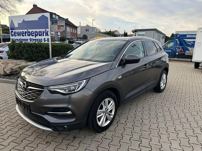 Mondstein grau/e:vulkan grau Gebraucht 2021 Opel Grandland X Elegance SUV | 11.990 € (Superpreis) - Bild 1/4