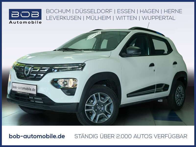 Kaolinweiß Gebraucht 2021 Dacia Spring Business Kleinwagen | 9.444 € - Bild 1/3