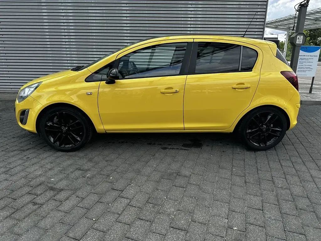 Gebraucht Opel Corsa Edition 101 PS (74 kW) 2013 Gelb Kleinwagen