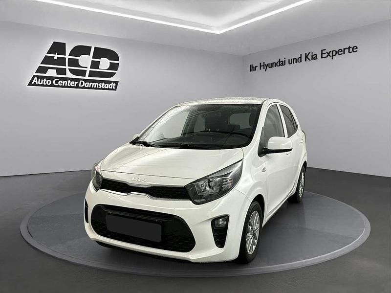 Schneeweiß Gebraucht 2022 Kia Picanto DREAM-TEAM Edition Kleinwagen | 12.970 € (Etwas zu teuer) - Bild 1/4