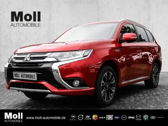 Rot rot metallic Gebraucht 2016 Mitsubishi Outlander P-HEV SUV | 18.875 € (Fairer Preis) - Bild 1/4