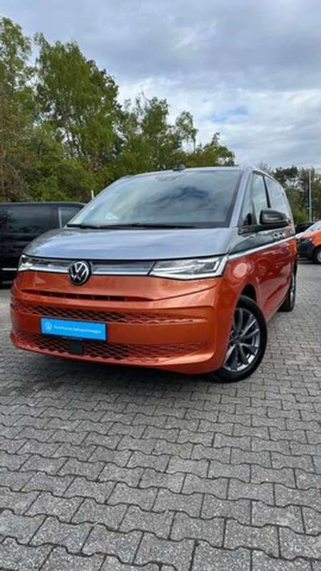 Energetic orange Gebraucht 2022 VW Multivan Energetic Van / Kleinbus | 75.990 € - Bild 1/4