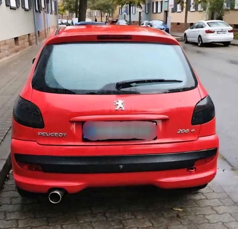 Gebraucht Peugeot 206+ 73 PS (53 kW) 2010 Rot Kleinwagen