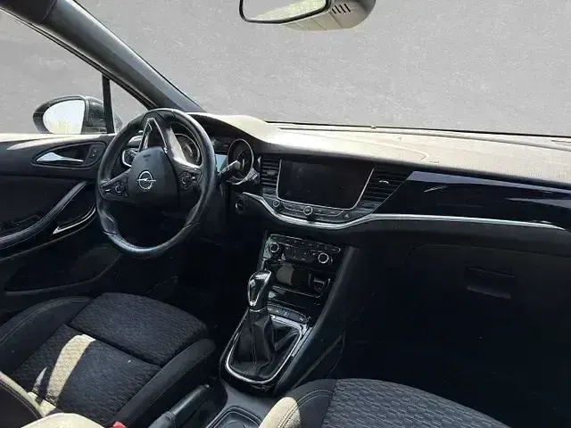 Używany Opel Astra Dynamic 160 KM (117 kW) 2016 Czarny Kombi