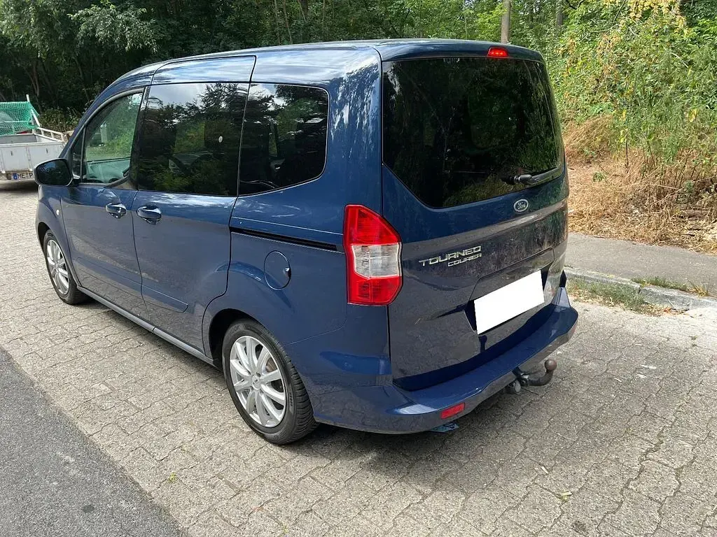 Gebraucht Ford Tourneo Courier Trend 101 PS (74 kW) 2016 Blau Van / Kleinbus
