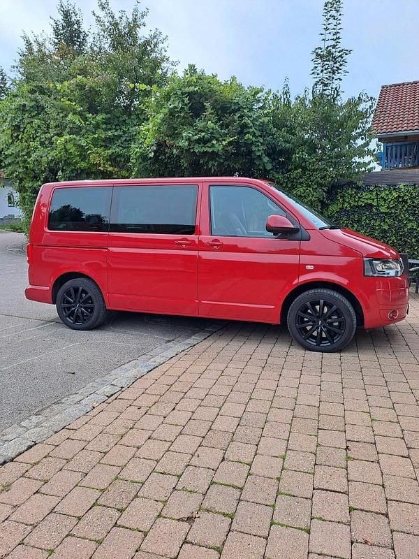 Rot Gebraucht 2013 VW Multivan Van | 21.499 € - Bild 1/4