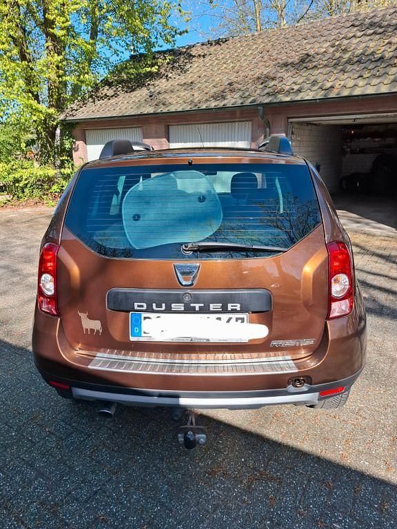 Używany Dacia Duster Prestige 105 KM (77 kW) 2012 Brązowy SUV