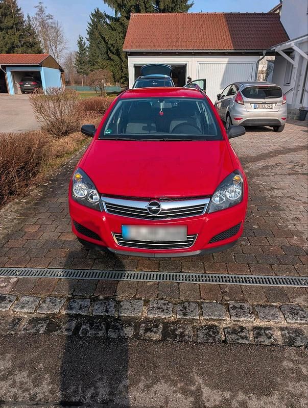 Second-hand Opel Astra 90 CP (66 kW) 2009 Roșu Berlinǎ