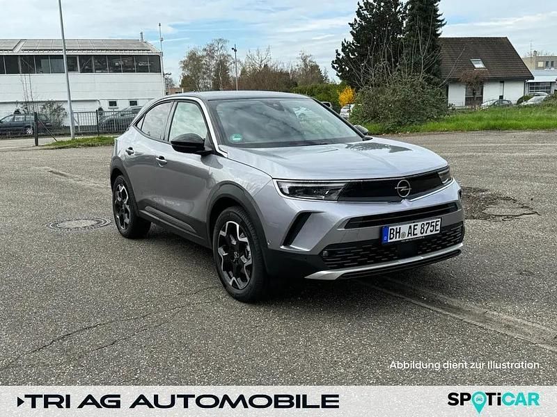 Kontrast grau (metallic) Gebraucht 2023 Opel Mokka-e Ultimate SUV | 26.810 € (Teuer) - Bild 1/4
