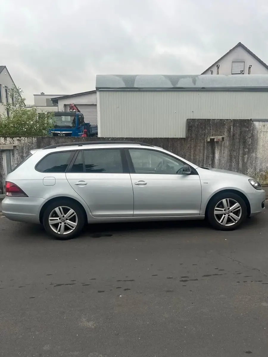 Second-hand VW Golf VII 105 CP (77 kW) 2013 Argintiu Break