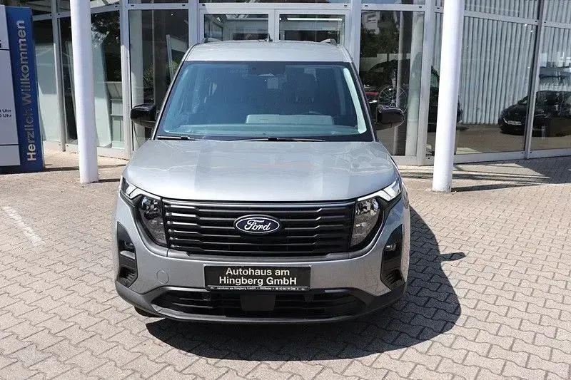 Gebraucht Ford Tourneo Courier Titanium 125 PS (91 kW) 2024 Silber Van / Kleinbus