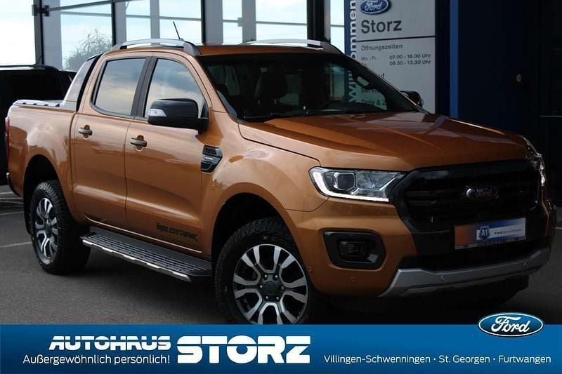 Orange (canyonorange) Gebraucht 2022 Ford Ranger Wildtrack Abholung | 38.990 € (Fairer Preis) - Bild 1/2