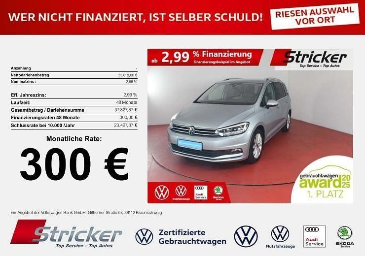 Silber (oyster silver metallic) Gebraucht 2024 VW Touran Highline Van / Kleinbus | 33.619 € (Fairer Preis) - Bild 1/4