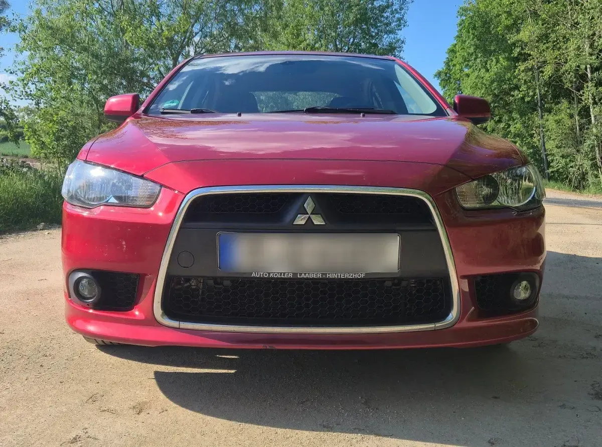 Gebraucht Mitsubishi Lancer 143 PS (105 kW) 2010 Rot Limousine