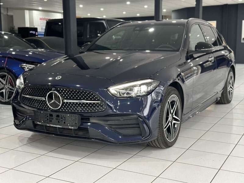 Cavansitblau metalliclack Gebraucht 2022 Mercedes C300e AMG Kombi | 37.990 € (Fairer Preis) - Bild 1/4