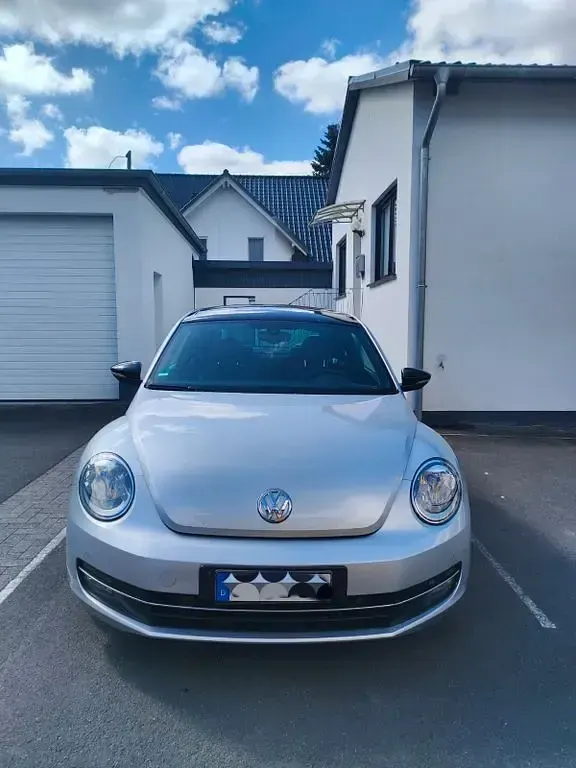 Używany VW Beetle Sport 200 KM (147 kW) 2012 Srebrny Hatchback