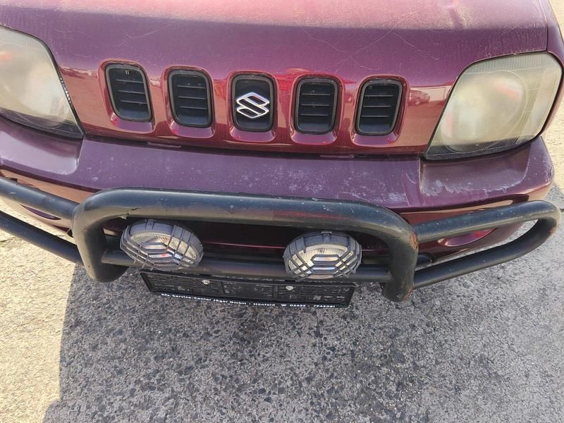 Gebraucht Suzuki Jimny 80 PS (58 kW) 2001 Rot SUV