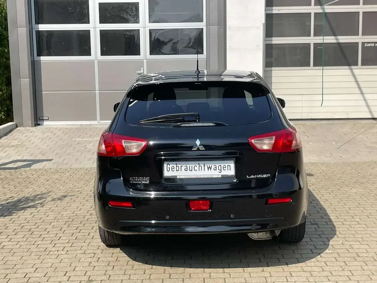 Gebraucht Mitsubishi Lancer Top 117 PS (86 kW) 2017 Pantherschwarz (p) Kleinwagen